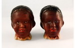 Pair of cruets formed as black children's heads