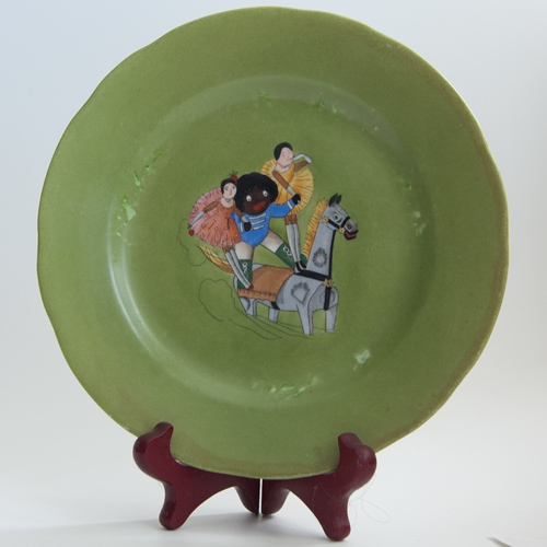 Plate with an illustration from 'The Golliwogg's Circus'