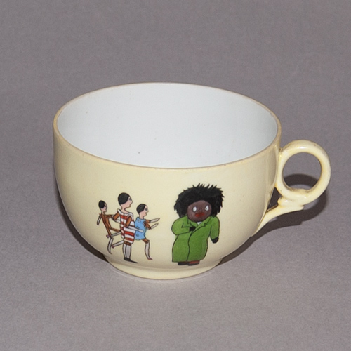 Cup with an illustration from 'The Golliwogg's Auto-go-cart'