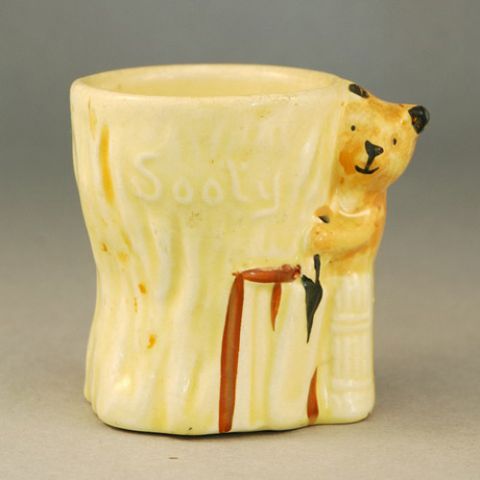 1950s Egg Cup modelled as Sooty playing cricket